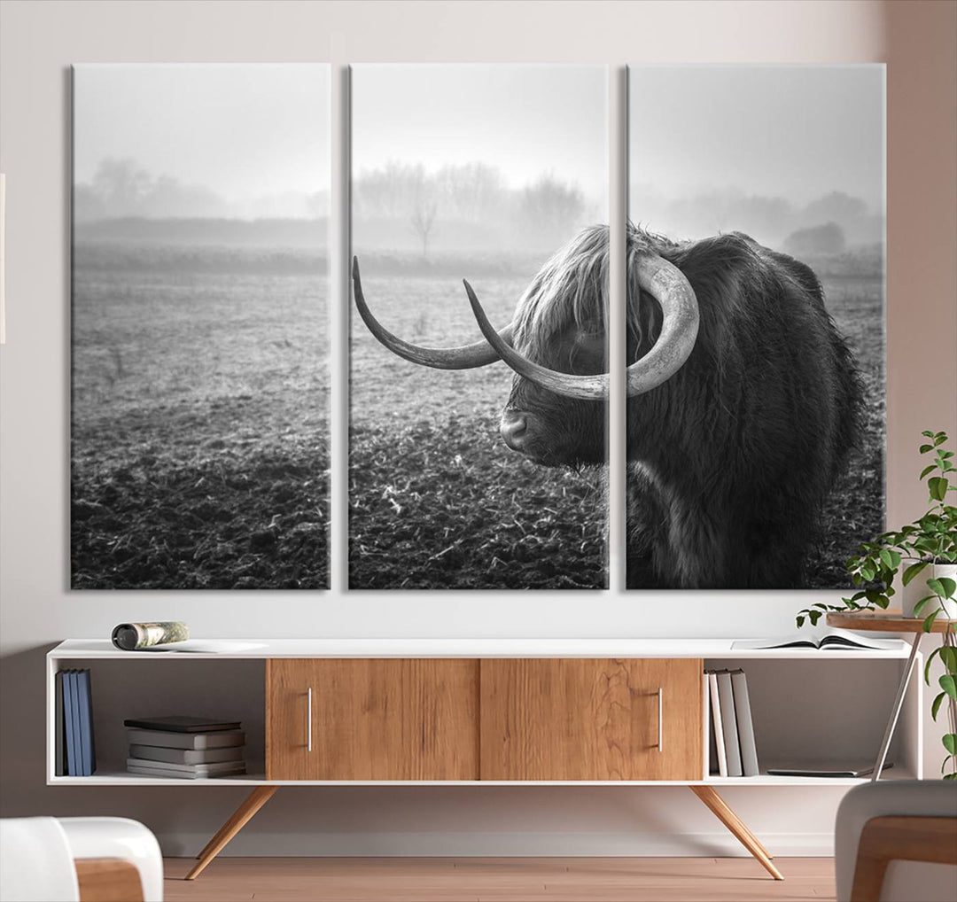 The living room features a three-panel wall art of a highland cow in a foggy field, using the Cow Wall Art Canvas Print for visual impact. This museum-quality canvas includes UV-protective coating to ensure longevity.