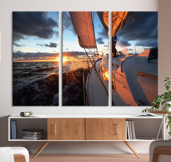 The modern living room is adorned with the Ocean Sunset Sailboat Wall Art, a triptych crafted on museum-quality canvas featuring UV-protective coating for lasting vibrancy.