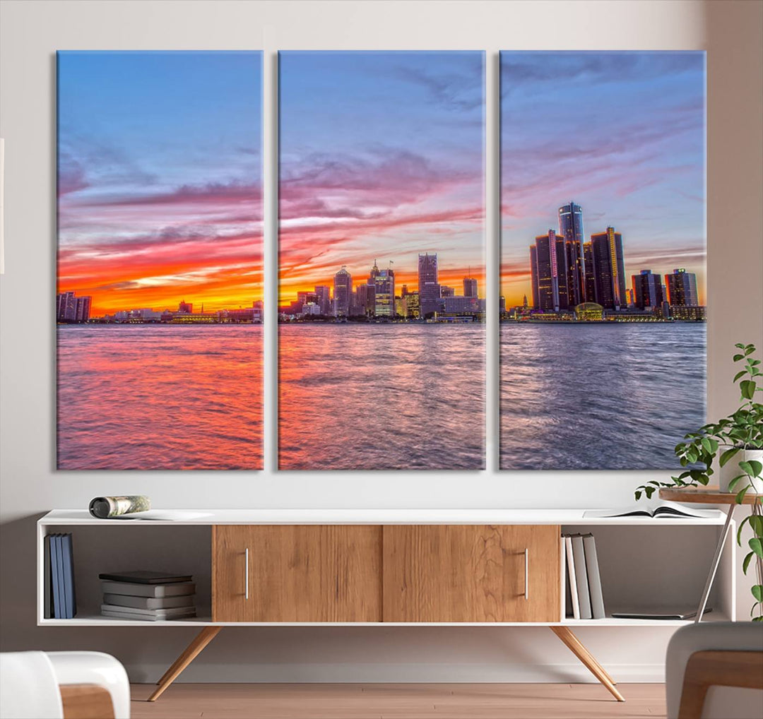 The Detroit City Lights Sunset Colorful Cloudy Skyline Cityscape View Wall Art Canvas Print showcases a vibrant city skyline at sunset over water. The artwork is museum-quality, comes ready to hang, and features a UV-protective coating to preserve its vivid colors.