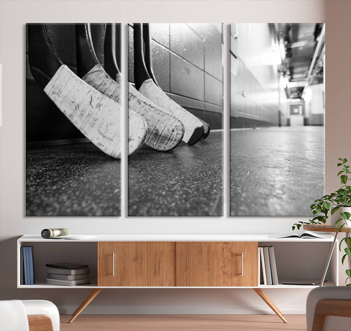 A living room featuring a large Ice Hockey Wall Art Canvas Print on gallery-wrapped canvas.