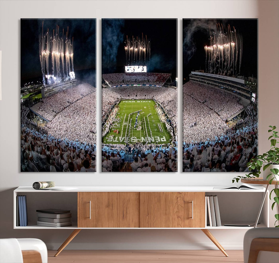 The Penn Stadium Football Wall Art Canvas Print showcases the lively ambiance of a bustling Pennsylvania University football stadium illuminated by fireworks.