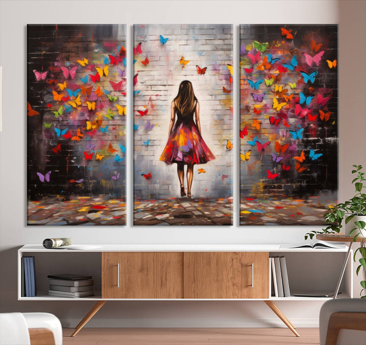 A vibrant artwork titled "Graffiti Wall Art Canvas Print Girl Butterfly Graffiti Abstract Canvas Print" is displayed above the couch. This gallery-wrapped masterpiece, printed on museum-quality canvas, features a UV-protective coating to preserve its vivid beauty.