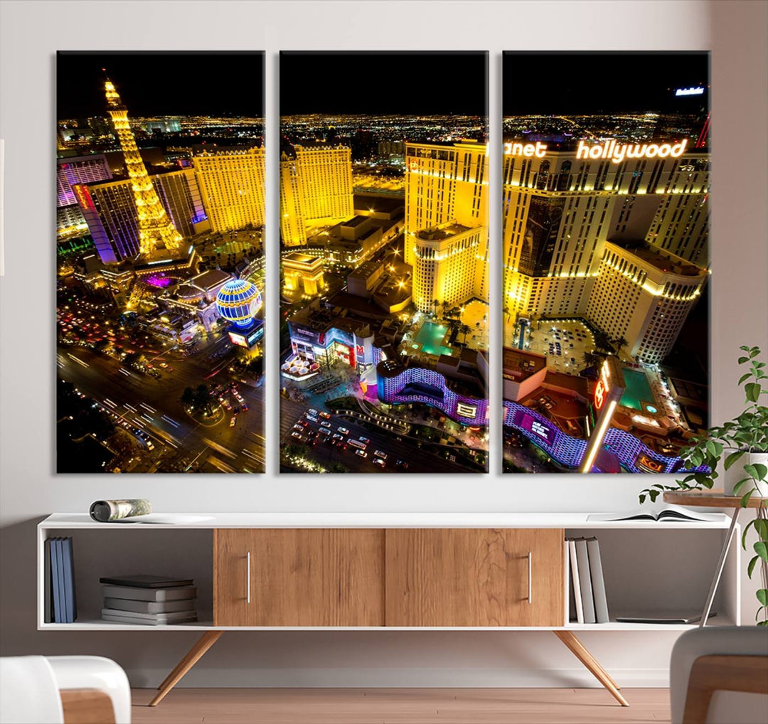 The modern living room features a Las Vegas Wall Art Canvas Print, a museum-quality triptych showcasing a vibrant cityscape with neon lights.