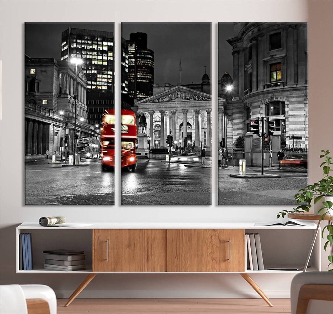 The London Night Red Bus Wall Art Canvas Print features a black and white cityscape with a moving red double-decker bus, crafted on museum-quality canvas with a UV-protective coating. This ready-to-hang artwork is designed to stand out and enhance any space.