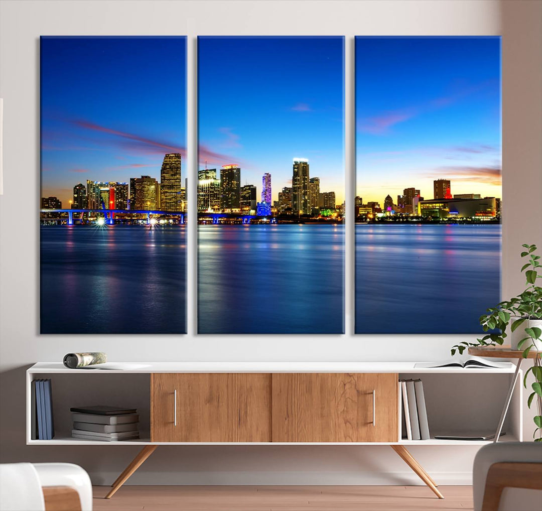 The living room features a Miami City Wall Art Canvas Print—a gallery-wrapped triptych displaying a city skyline at dusk, adding museum-quality elegance to the space.