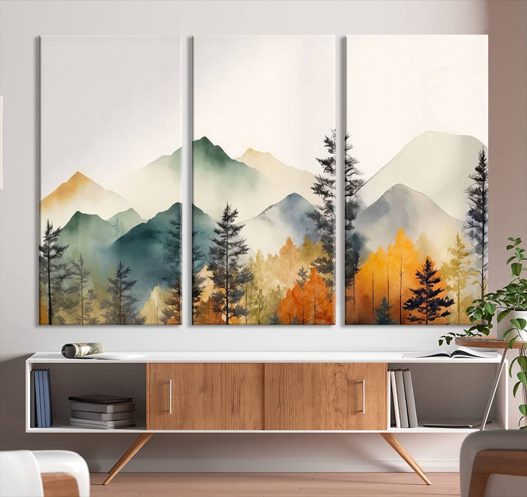 The Abstract Watercolor Mountains and Trees Autumn Wall Art, crafted on museum-quality canvas, decorates the space with its stunning triptych design. This wall art features autumn-colored mountains and trees, expertly gallery wrapped for a seamless and elegant addition to your living room.