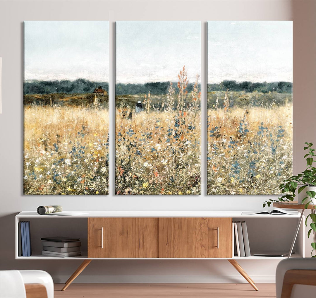 The "Wildflower Field Wall Art Canvas" brings rustic charm to the room with its nature-inspired landscape print, making it a perfect addition to the living room or office.