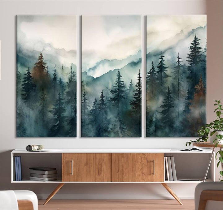 A set of Serenity Forest Wall Art Canvas prints, showcasing foggy mountain landscapes, is displayed in the living room.