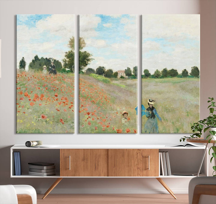 The Claude Monet The Poppy Field Canvas Print features a scene of a serene meadow with blooming flowers and a woman and child. It is printed on museum-quality canvas with UV-protective coating.