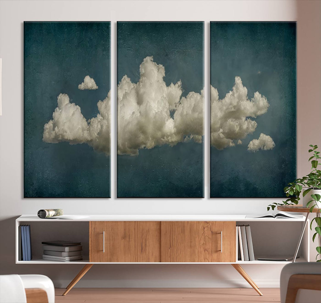 The Vintage Green Clouds Wall Art Canvas Print, set against a teal backdrop, showcases breathtaking canvas artwork with a gallery-quality finish.