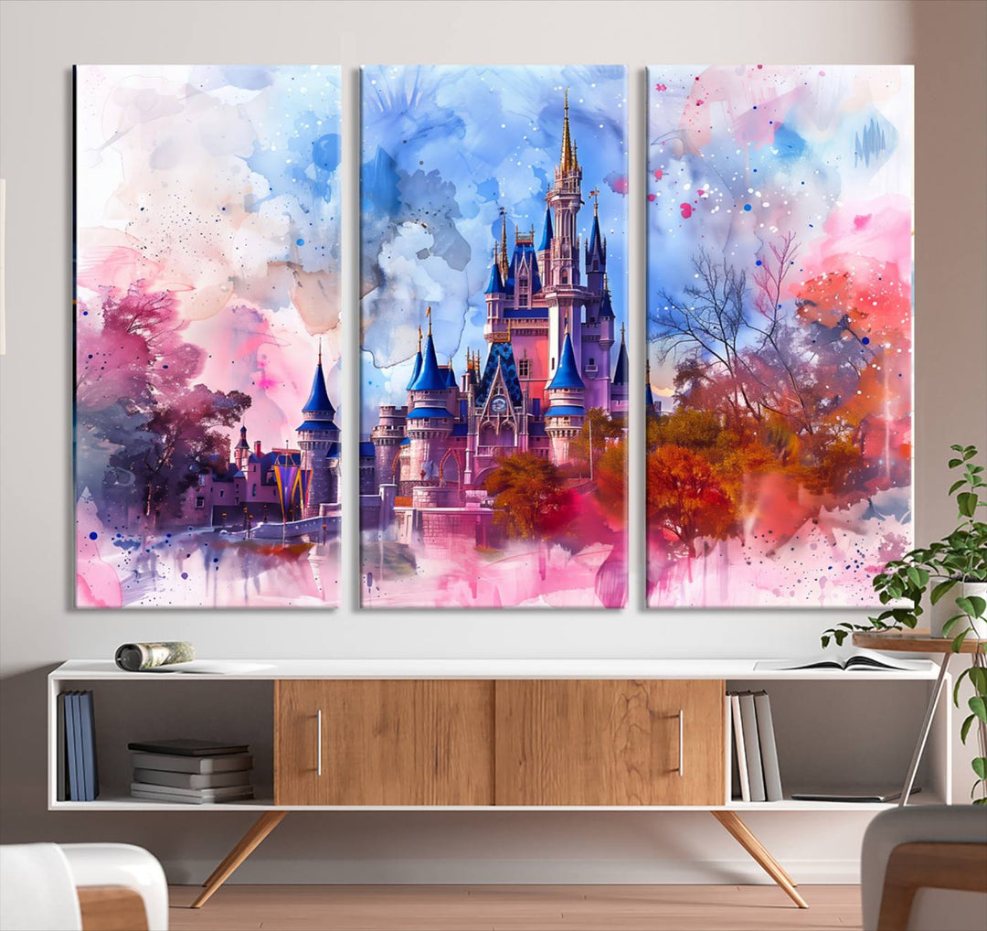 The Disney Wall Art: Dreamy Watercolor Cinderella Castle Canvas Print features a fairy-tale castle with vibrant pink, blue, and purple hues. Expertly handmade in the USA, this premium canvas wall art adds a touch of enchantment to any room.