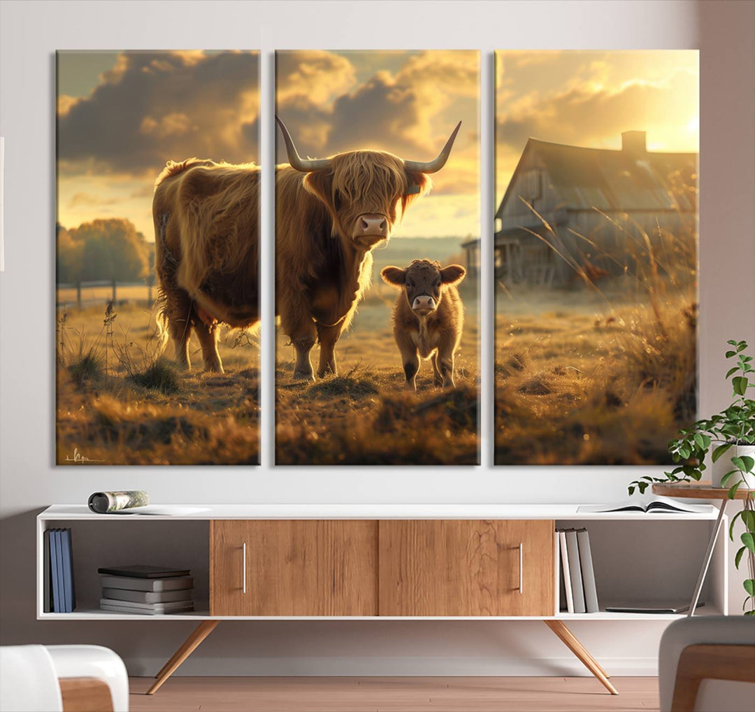 The "Highland Baby Cow Canvas Wall Art Animal Print" triptych art piece showcases a cow and calf in a sunlit field with a barn in the background.