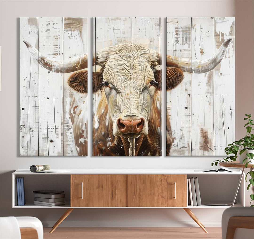 The dimly lit room is enhanced with Western charm by the Rustic Longhorn Bull Wall Art Canvas Set—Western-Inspired Farmhouse Décor, elegantly displayed on the wall.