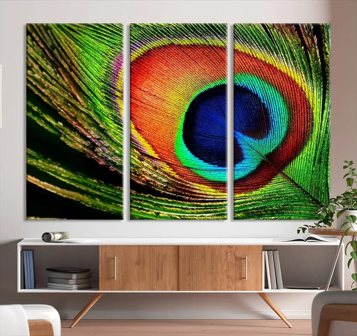 The living room features the "Colorful Peacock Feather Wall Art Print," showcasing a vibrant green, blue, and orange design elegantly displayed above a modern sofa.