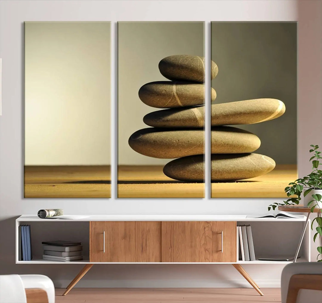 The "Yellow Zen Stones on Yellow Background Wall Art Yoga Zen Artwork," a professionally hand-assembled framed photo with UV-protective coating, is displayed on the wall.