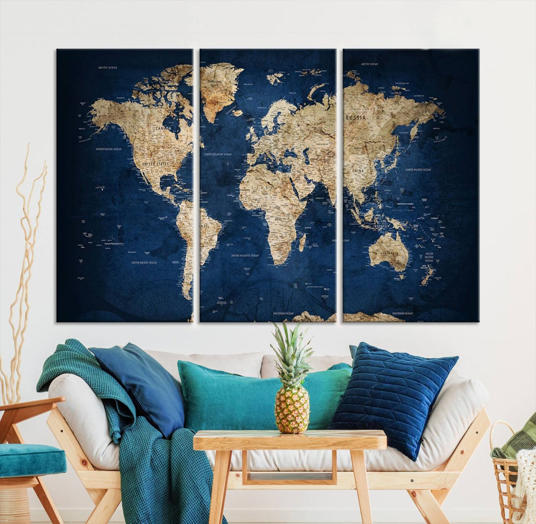 A triptych canvas print titled "Vintage Blue World Map Canvas Print - Classic World Map Design on Deep Blue Wall Art Print" adorns the wall, enhancing the decor with its antique style.