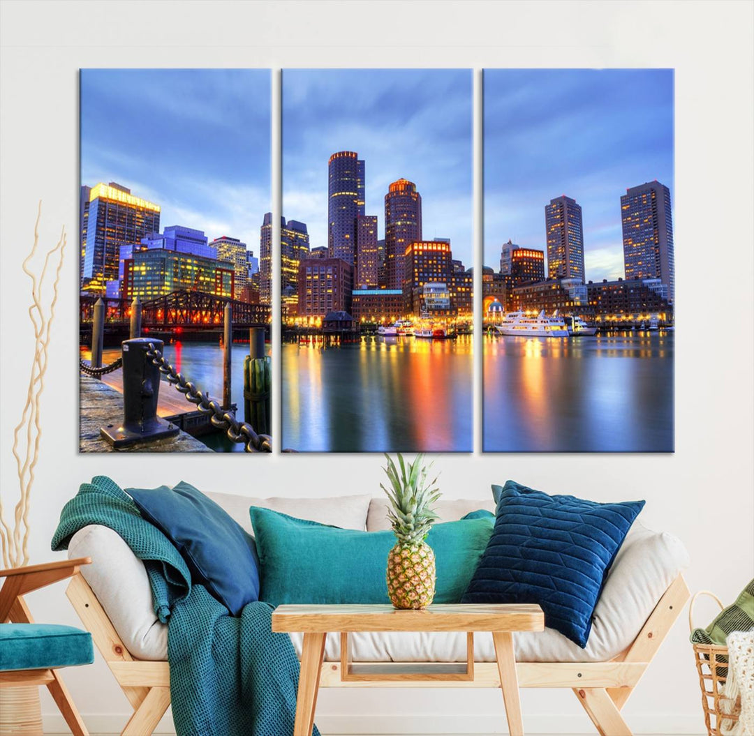 The Boston City Lights Sunset Cloudy Blue Skyline Cityscape View Wall Art Canvas Print embellishes a contemporary living room. This gallery-wrapped canvas set guarantees museum-quality canvases to enhance any space.