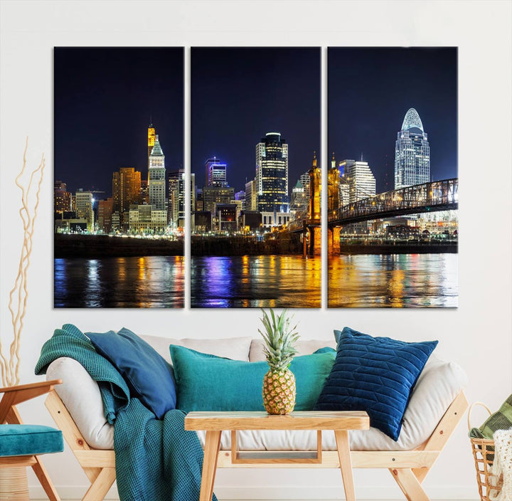 The Cincinnati City Lights Night Skyline Cityscape View Wall Art Canvas Print, crafted on museum-quality canvas with UV-protective coating and ready to hang, adds a touch of sophistication to the wall.