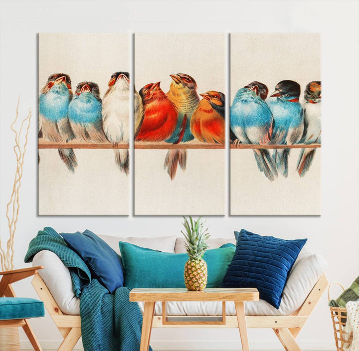 The Abstract Birds Wall Art Canvas Print, featuring a triptych of colorful birds perched on a branch, is printed on museum-quality canvas and equipped with a UV-protective coating and ready-to-hang design. This artwork adds vibrant elegance to your living space.