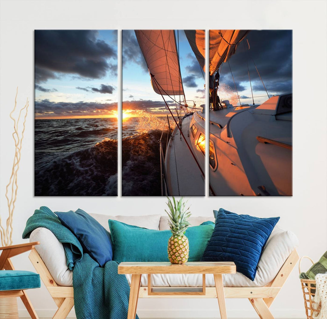 The modern living room is adorned with the Ocean Sunset Sailboat Wall Art, a triptych crafted on museum-quality canvas featuring UV-protective coating for lasting vibrancy.