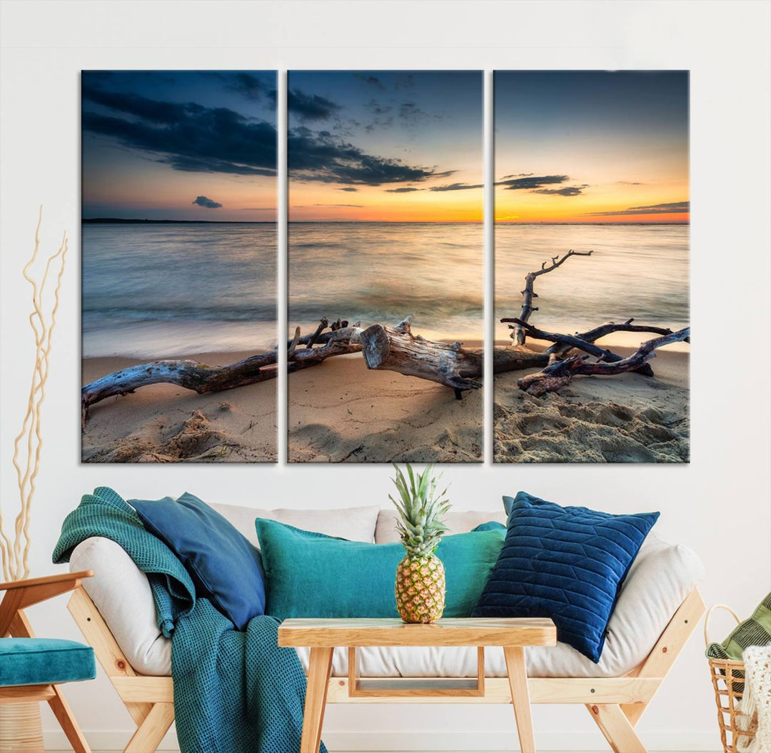 A captivating piece of Ocean Sunset Beach Wall Art Canvas Print, gallery wrapped, graces the gray wall.