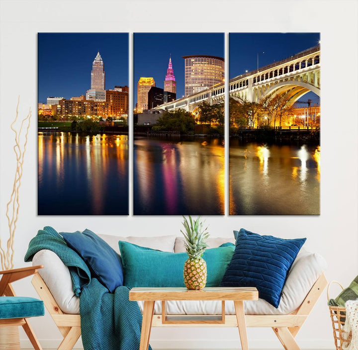 The "Cleveland Night Skyline Wall Art City Cityscape Canvas Print" is a striking feature in the room, showcasing a city skyline with a bridge reflecting in a river. Displayed on museum-quality canvas, it offers enduring beauty.