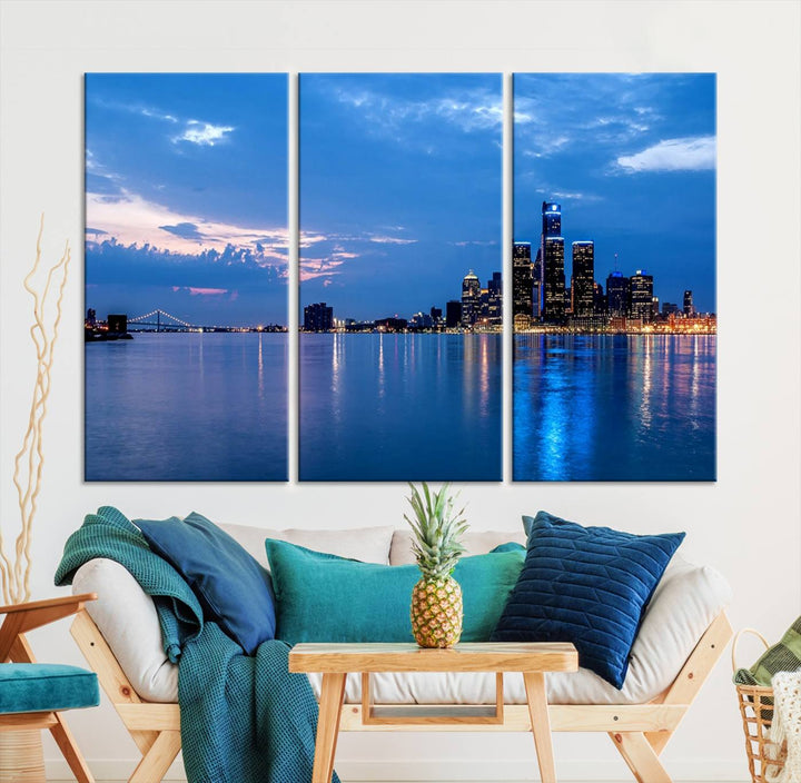 The "Detroit City Lights Night Blue Cloudy Skyline Cityscape View" wall art, displayed on museum-quality canvases, is split into three gallery-wrapped panels.