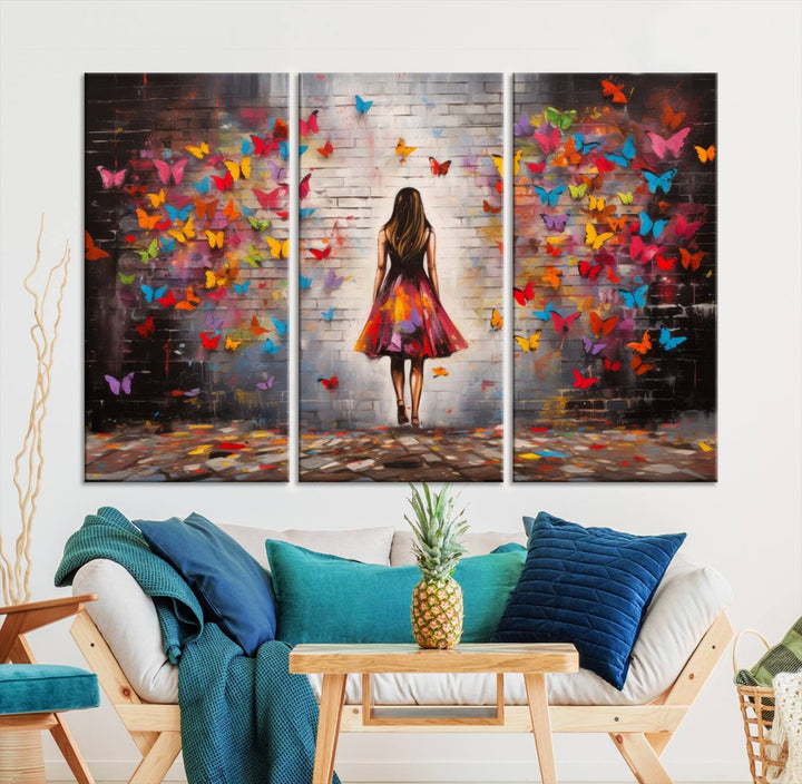 A vibrant artwork titled "Graffiti Wall Art Canvas Print Girl Butterfly Graffiti Abstract Canvas Print" is displayed above the couch. This gallery-wrapped masterpiece, printed on museum-quality canvas, features a UV-protective coating to preserve its vivid beauty.