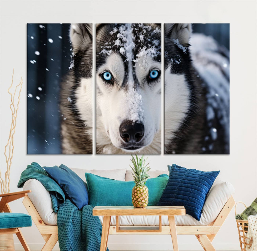 A digital art piece titled "Winter Siberian Husky Wolf Wall Art Canvas Print" showcases a blue-eyed husky blanketed in snow. Printed on high-quality canvas, it is an ideal choice for nature and dog enthusiasts.