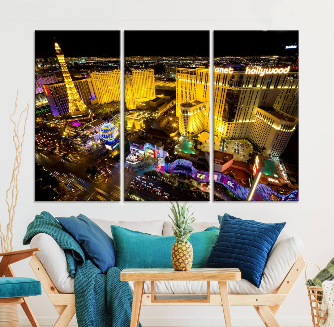 The modern living room features a Las Vegas Wall Art Canvas Print, a museum-quality triptych showcasing a vibrant cityscape with neon lights.