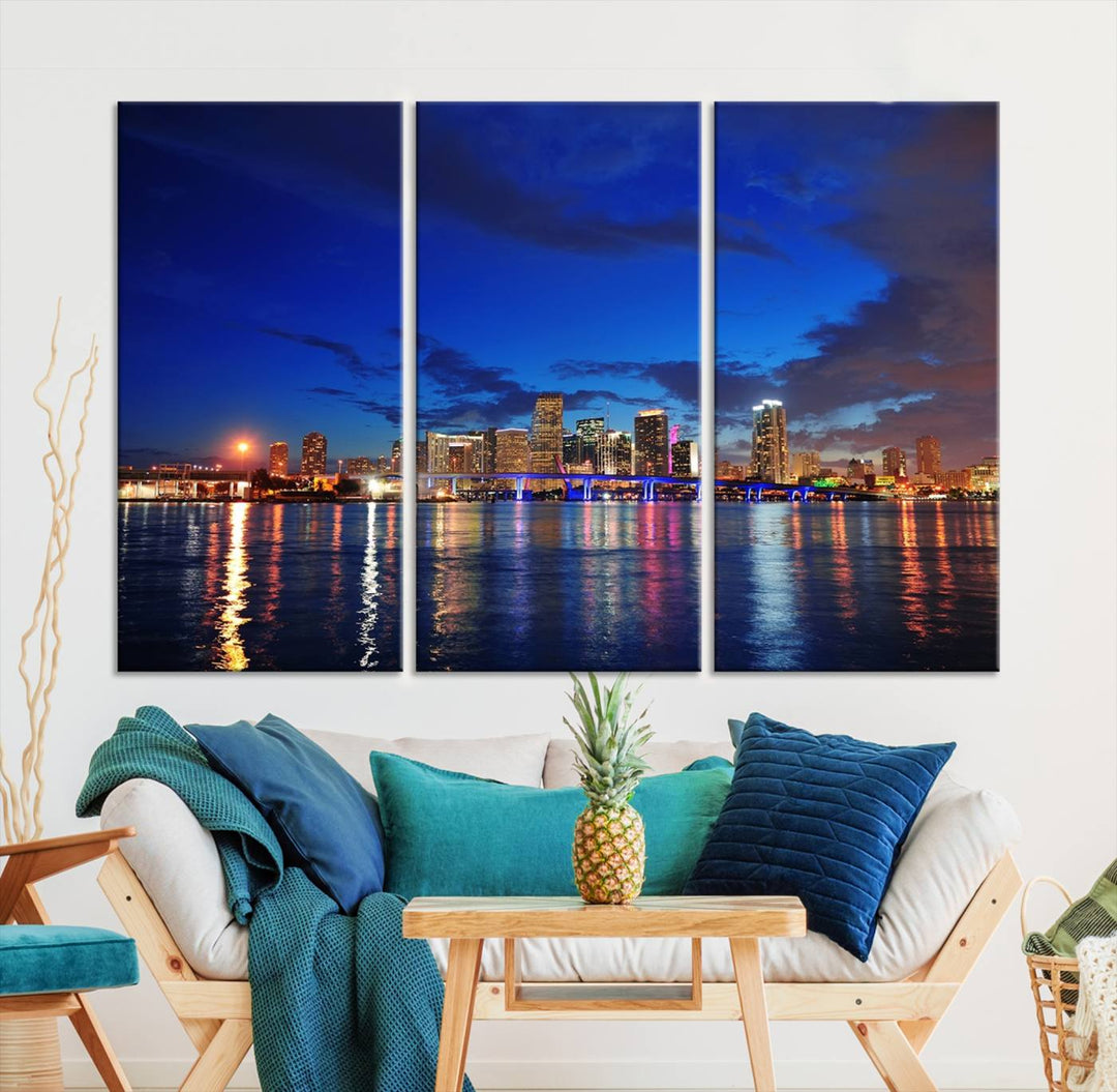 A large Miami City View Wall Art Canvas Print featuring the Miami City Skyline Panorama at night is displayed above the dresser.