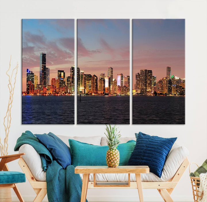 The living room features a gallery-wrapped triptych of the Miami City Wall Art Canvas Print above the sofa.