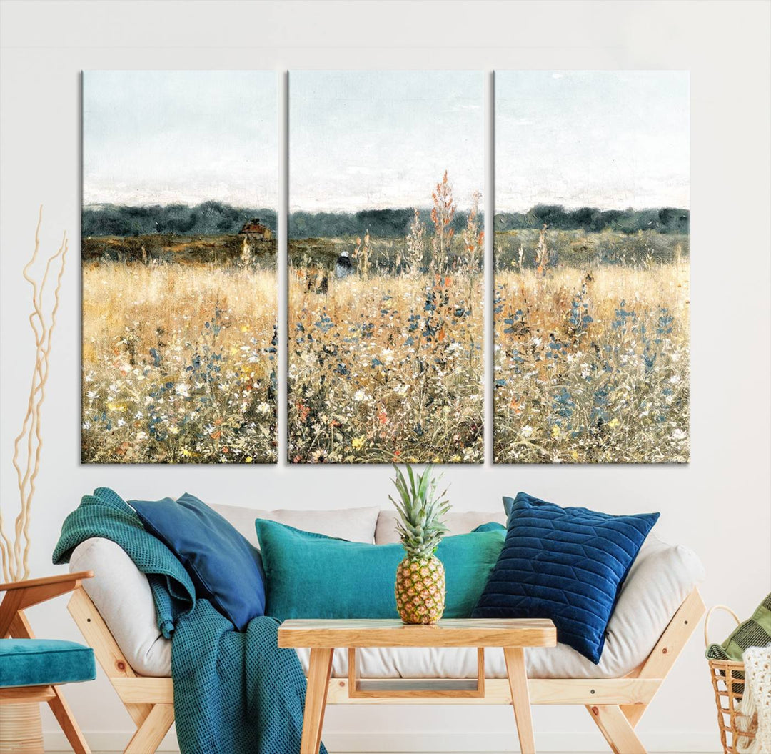 The "Wildflower Field Wall Art Canvas" brings rustic charm to the room with its nature-inspired landscape print, making it a perfect addition to the living room or office.