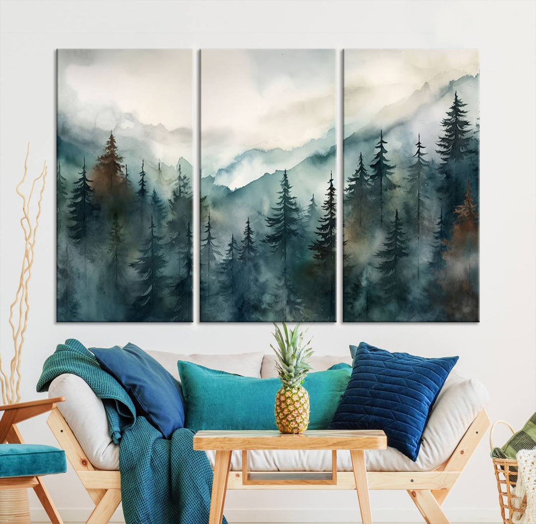 A set of Serenity Forest Wall Art Canvas prints, showcasing foggy mountain landscapes, is displayed in the living room.