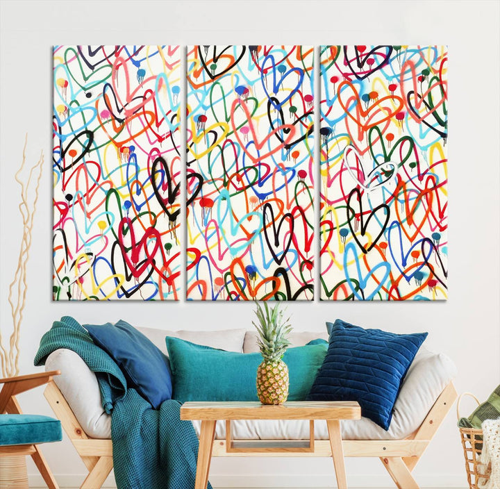 The "Colorful Love Canvas print," featuring vibrant abstract street art with overlapping loops, is handmade in the USA.