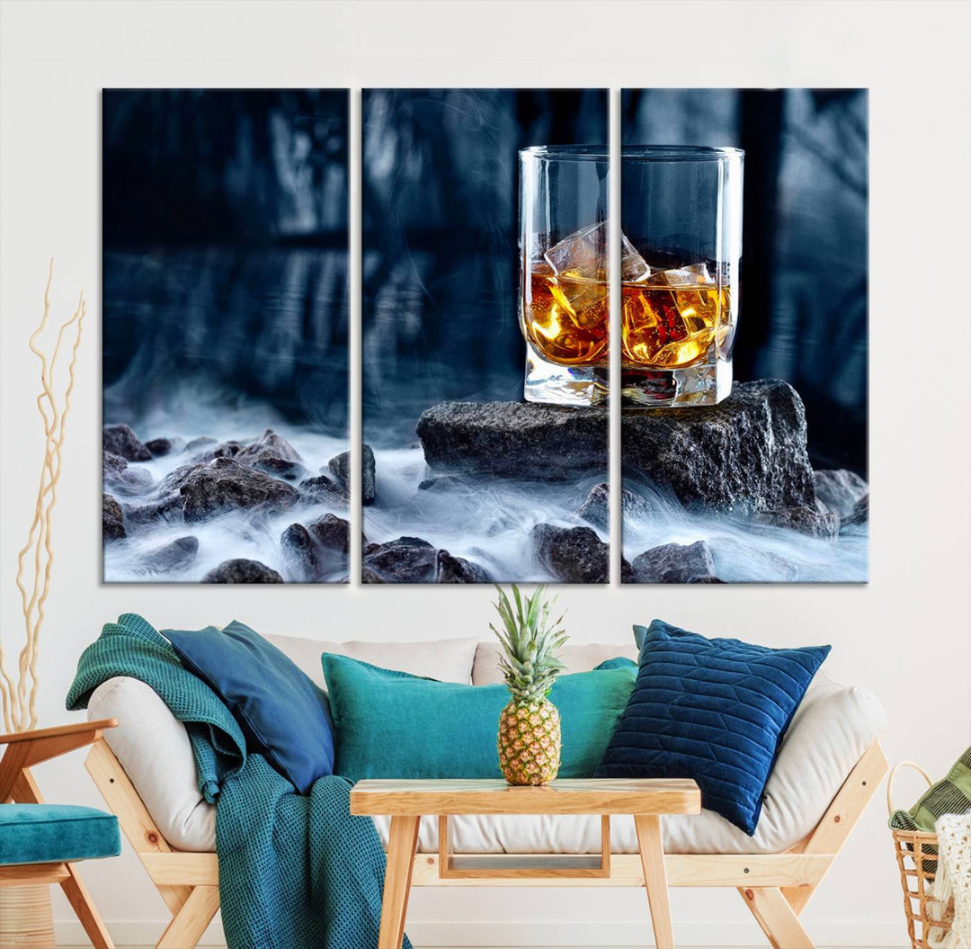 The Whiskey Ice Wall Art Canvas Print, a triptych featuring a glass of whiskey on the rocks, is crafted with a gallery-quality finish on premium canvas.