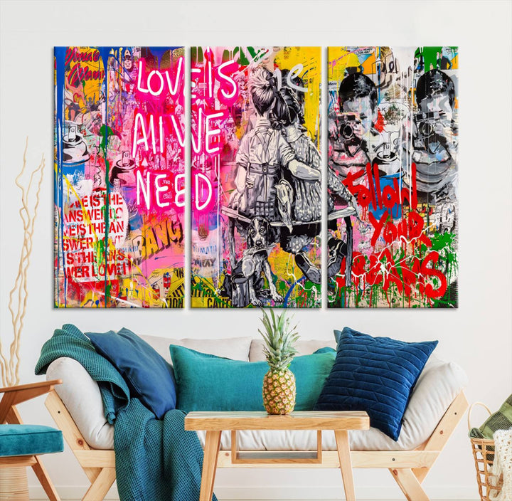 A vivid display of the "Follow Your Dreams & Love is All We Need" graffiti street art energizes a modern room with its three-panel arrangement. This bold giclee canvas print infuses any contemporary space with dynamic flair.