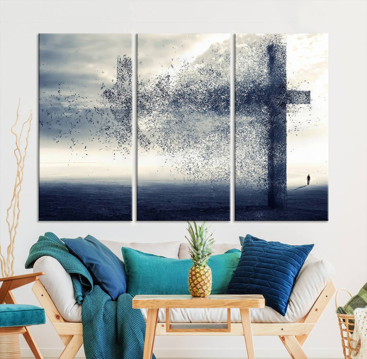 The "Jesus and the Fading Cross – Symbol of Faith" framed canvas print beautifully depicts a cross formed by birds against a moody sky above an ocean. This piece of Christian wall art infuses spirituality into the minimalist space.