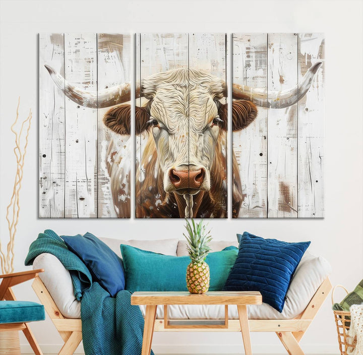 The dimly lit room is enhanced with Western charm by the Rustic Longhorn Bull Wall Art Canvas Set—Western-Inspired Farmhouse Décor, elegantly displayed on the wall.