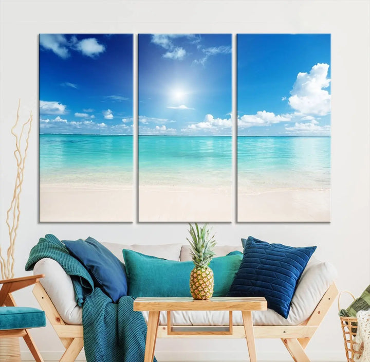 A contemporary living room showcasing the Wall Art Canvas Light Blue Beach and Ocean View.