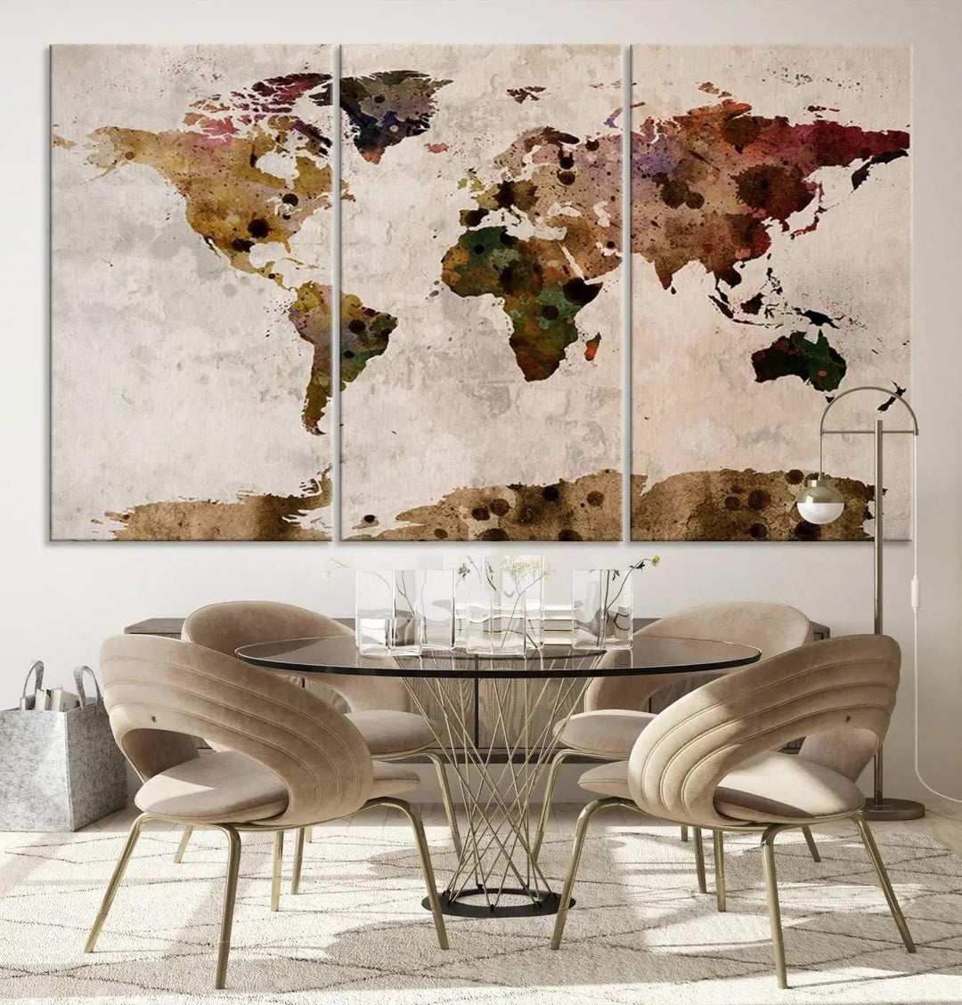 A Watercolor World Map Canvas Print, wrapped in an elegant gallery style, hangs on the wall.