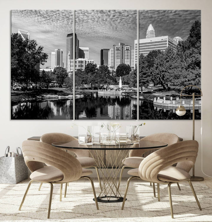 The living room features a captivating triptych titled "Charlotte City Cloudy Skyline Black and White Wall Art Cityscape Canvas Print," crafted on museum-quality canvas with UV-protective coating. Modern decor accentuates the dynamic scene.