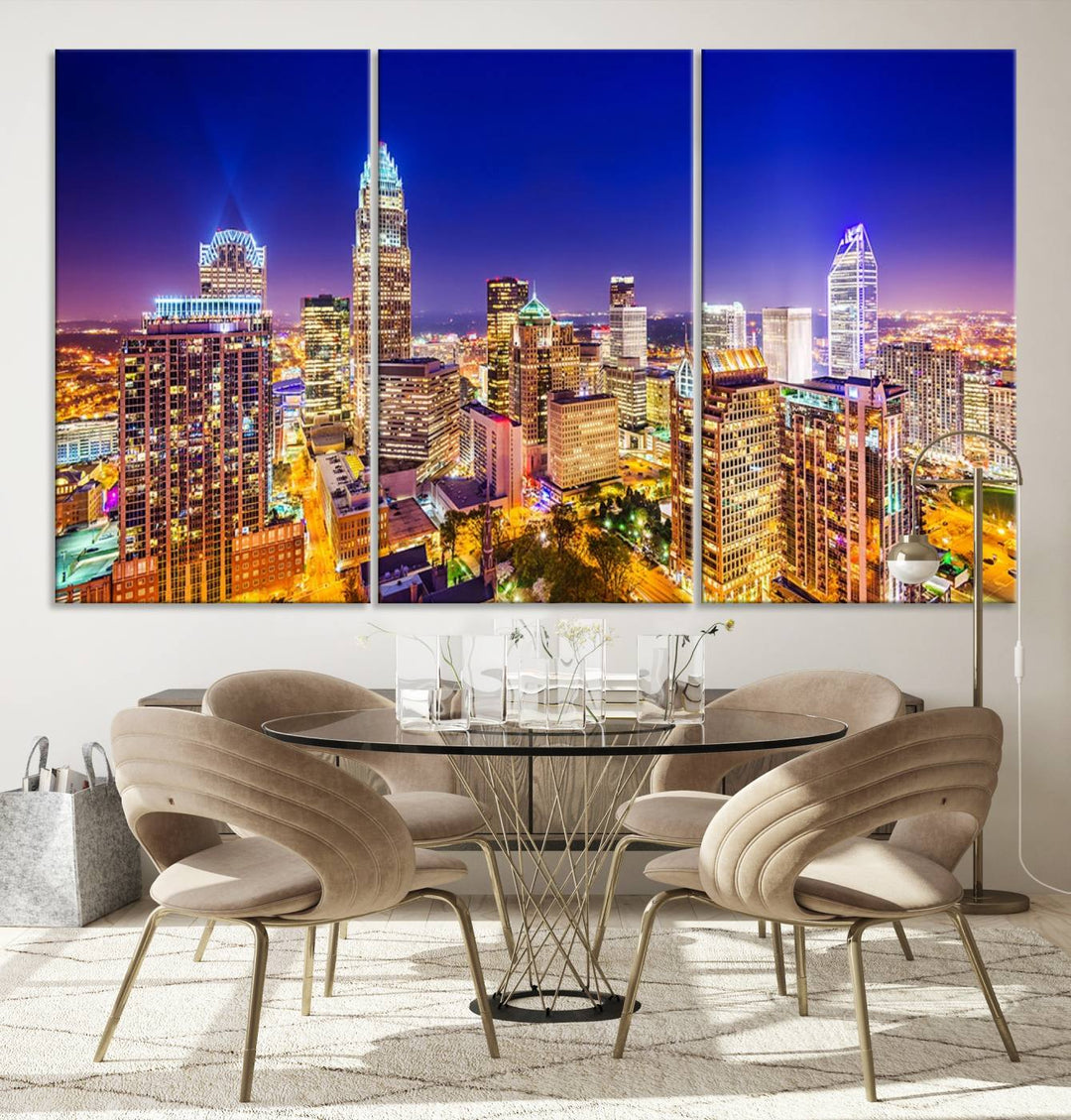 A modern living room features the Charlotte City Lights Night Blue Skyline Cityscape View wall art canvas print.