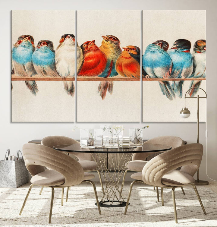 The Abstract Birds Wall Art Canvas Print, featuring a triptych of colorful birds perched on a branch, is printed on museum-quality canvas and equipped with a UV-protective coating and ready-to-hang design. This artwork adds vibrant elegance to your living space.