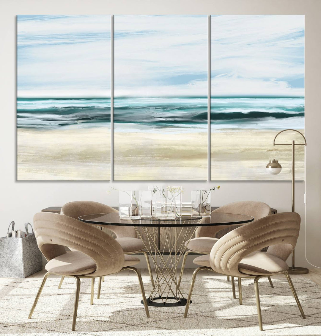 The room features the Ocean Abstract Wall Art Canvas Print, a triptych beach painting on museum-quality canvas with a gallery-wrapped finish and UV-protective coating.