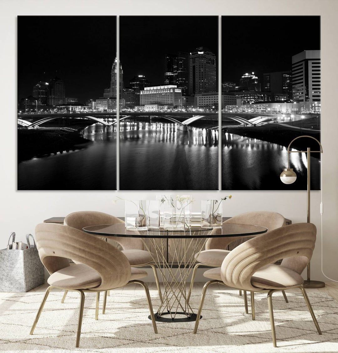 The living room features the "Columbus City Lights Skyline Black and White Wall Art Cityscape Canvas Print" above a coffee table. This artwork is presented as a triptych on museum-quality canvases with UV-protective coating.