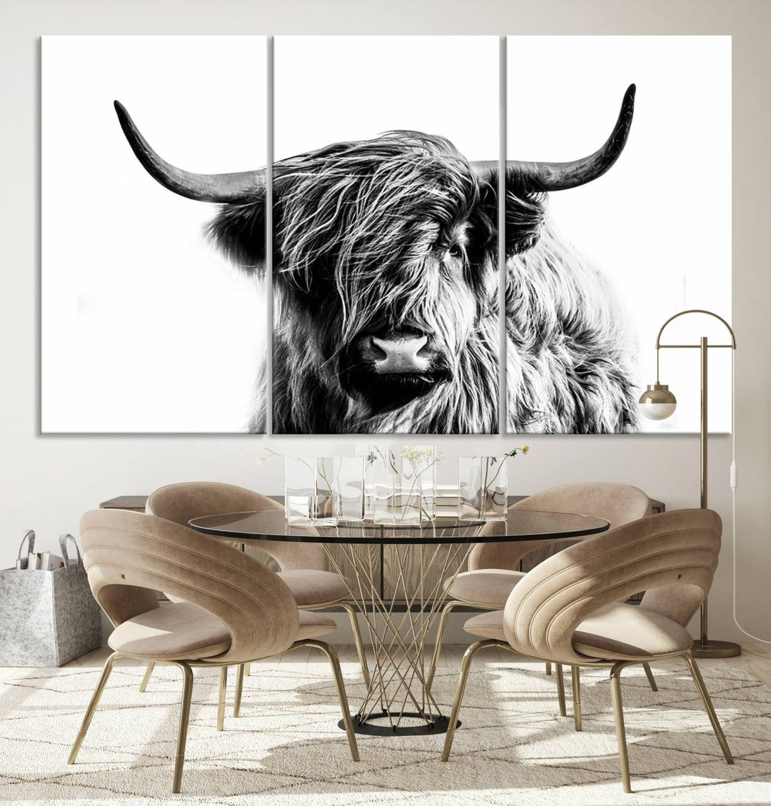 The Scottish Highland Cow Cattle Art Print Farmhouse Wall Art Canvas Print enhances rustic farmhouse decor with its depiction of a long-haired, large-horned cow. This triptych is an ideal choice for chic wall art.