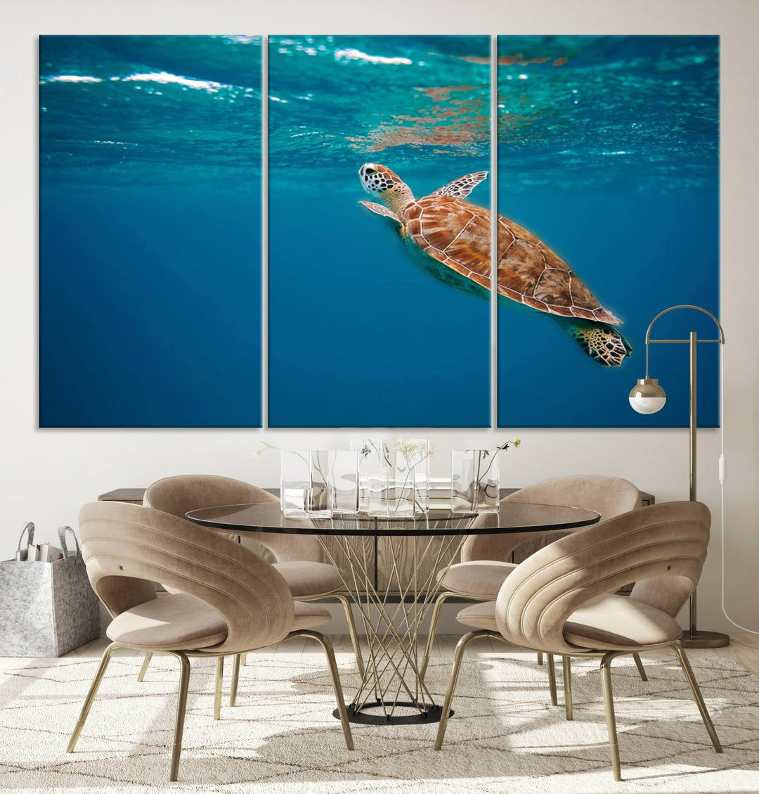 The living room features the "Baby Turtle in Ocean" wall art canvas print. This gallery-quality piece, depicting a sea turtle swimming underwater, adds an elegant touch to the space.