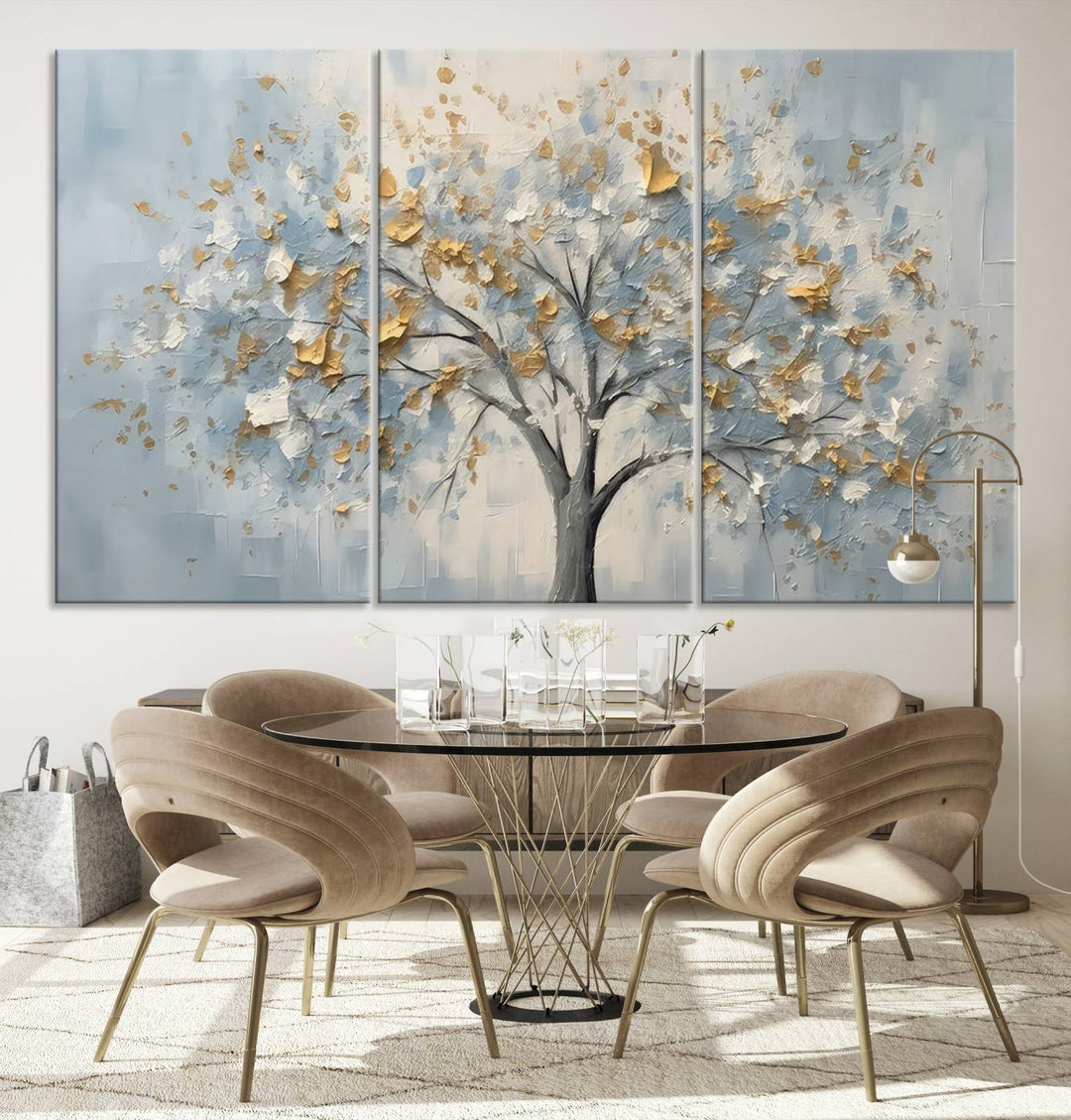 An Abstract Tree Wall Art Canvas Print with textured golden leaves on a blue background is a stunning modern, nature-inspired art piece. This ready-to-hang artwork is perfect for enhancing living room or bedroom decor.