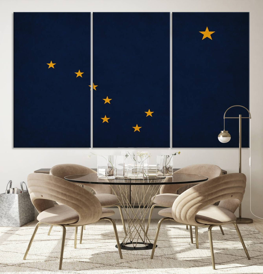 A contemporary living room featuring a triptych artwork of stars on a navy background, accentuated by the striking Alaska States Flag Wall Art Canvas Print.